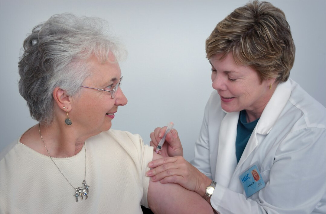 Doctor consulting an elderly patient