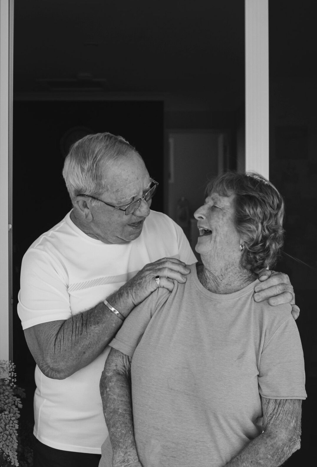 elderly couple smiling