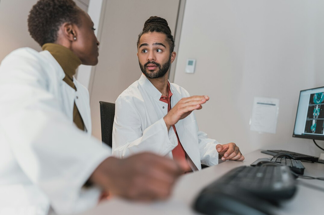 doctor explaining insurance options
