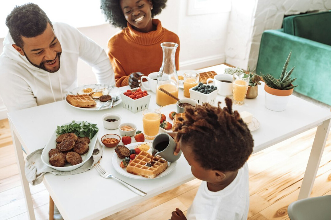 family enjoying healthy meal together