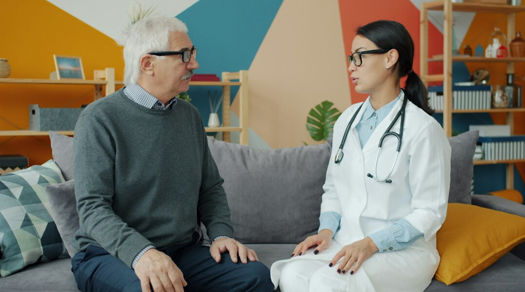 elderly person with doctor