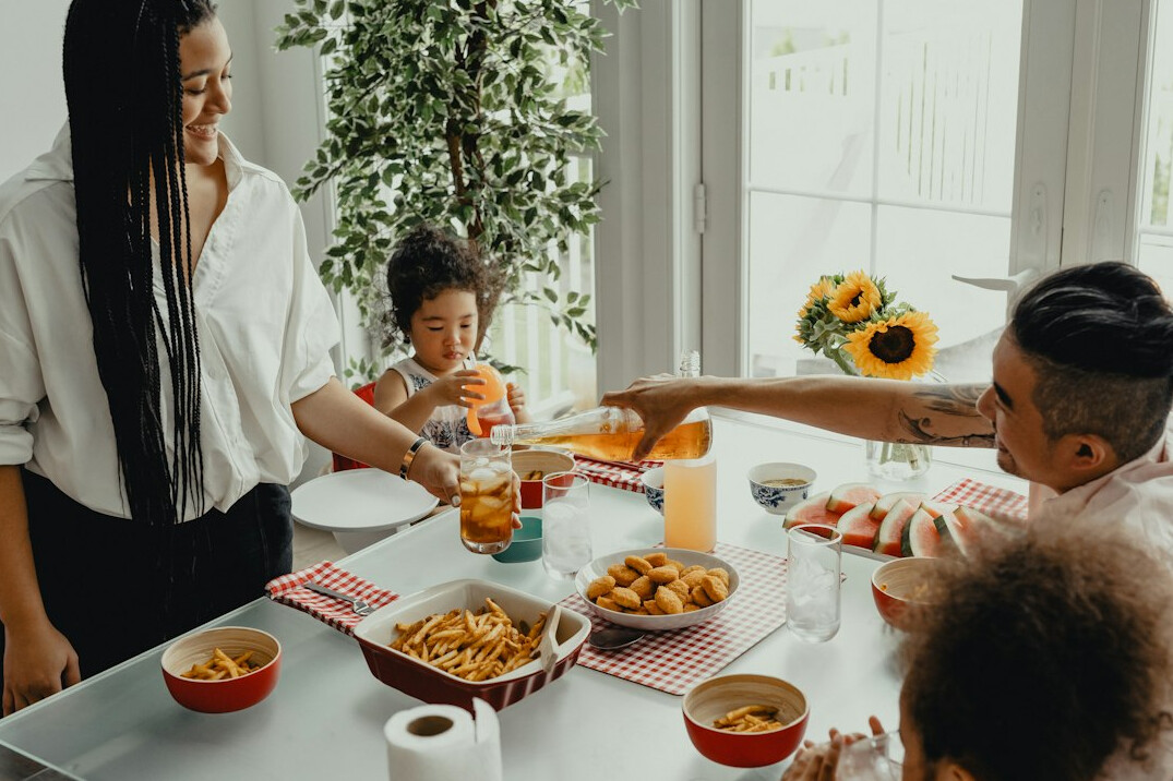 family enjoying healthy meal together